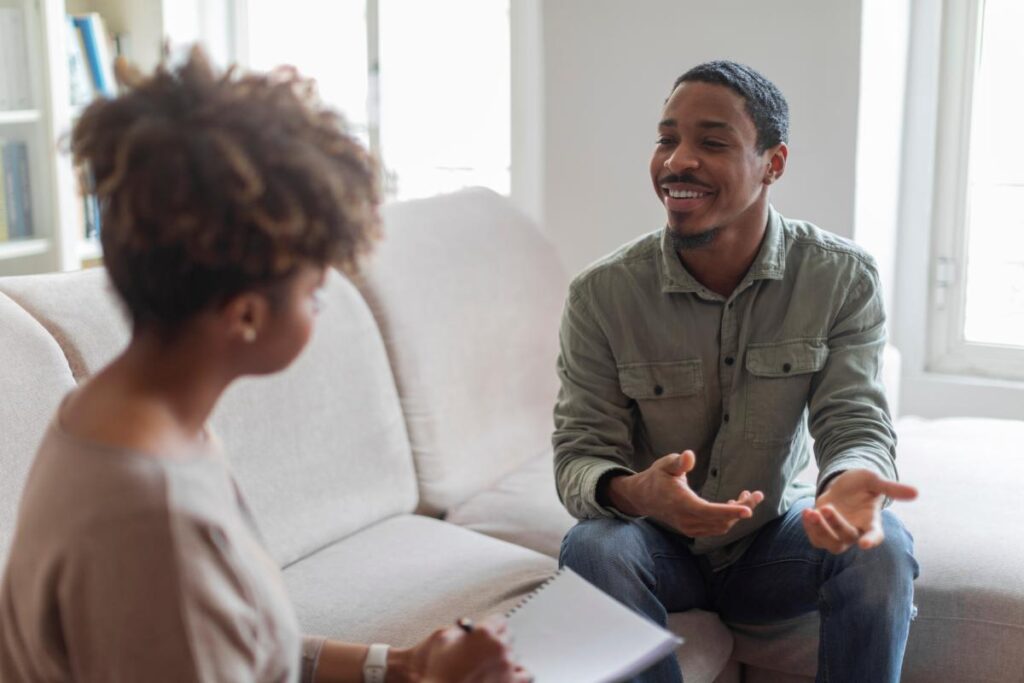 Man talks to his therapist about the benefits of Vivitrol treatment